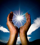 HandsAroundLightSun